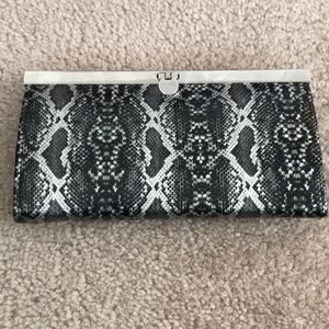 Bebe snakeskin print clutch